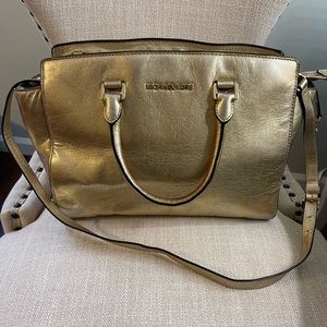 Gold Michael Kors handbag